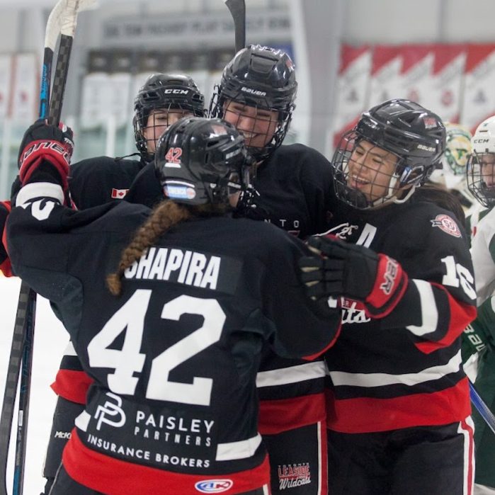 Leaside Wildcats players celebrating together